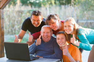 Family with thumbs up
